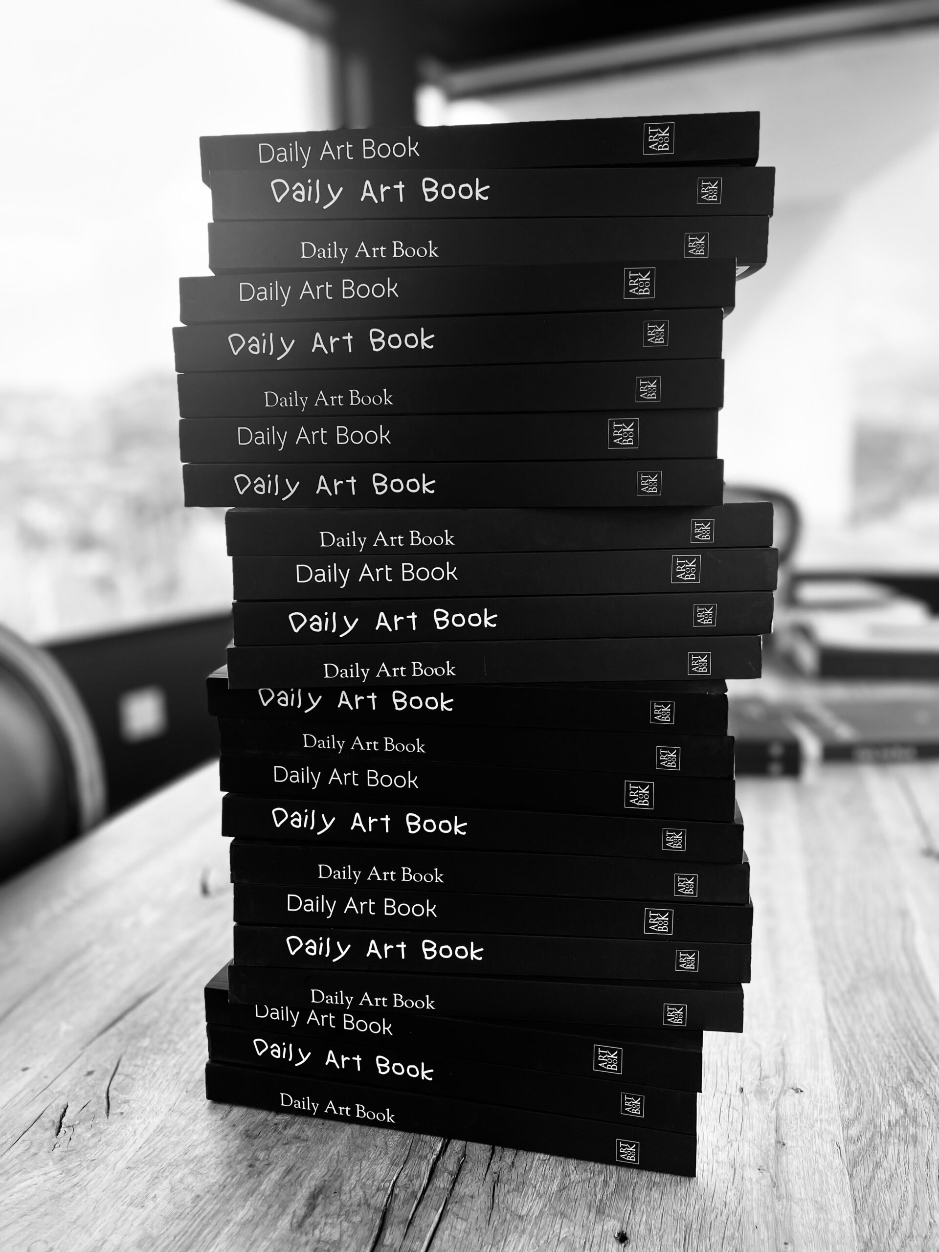 stack of daily art books